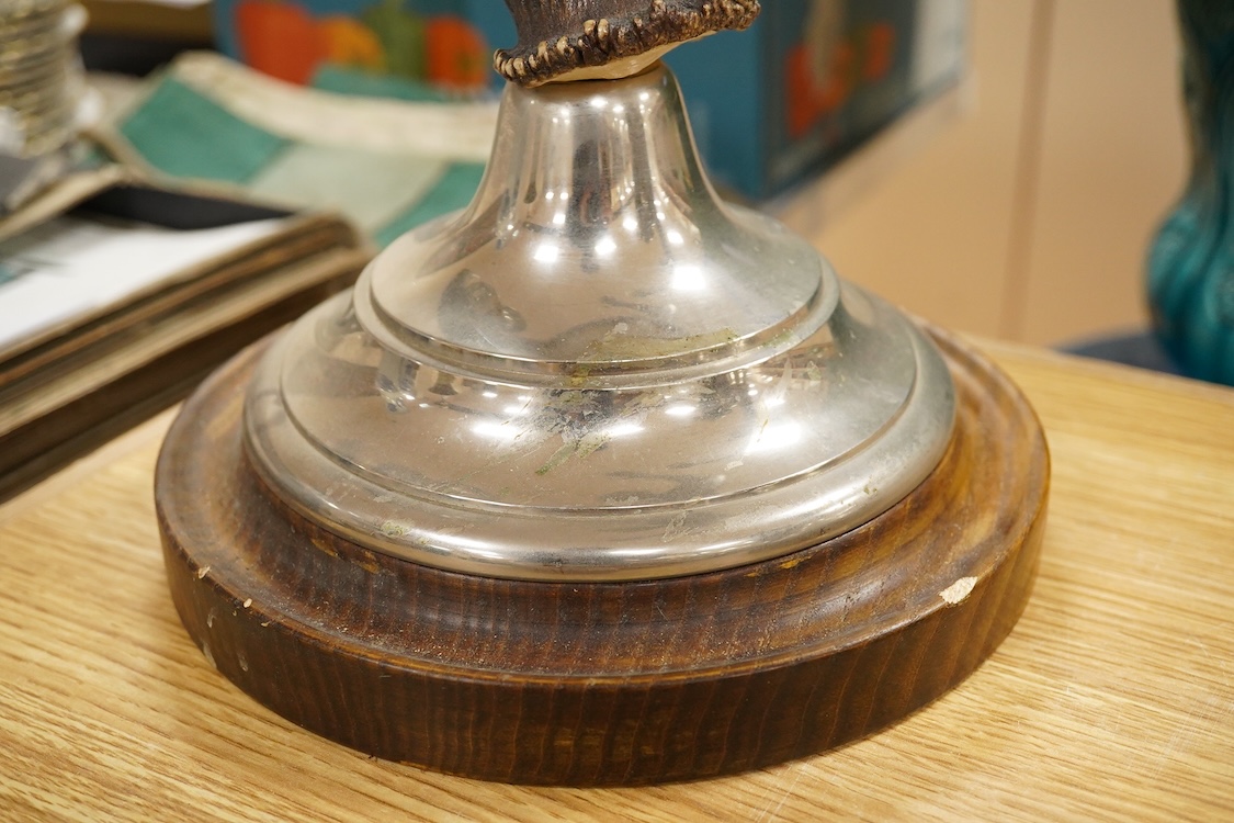 A pair of three light antler candlesticks, 67cm high